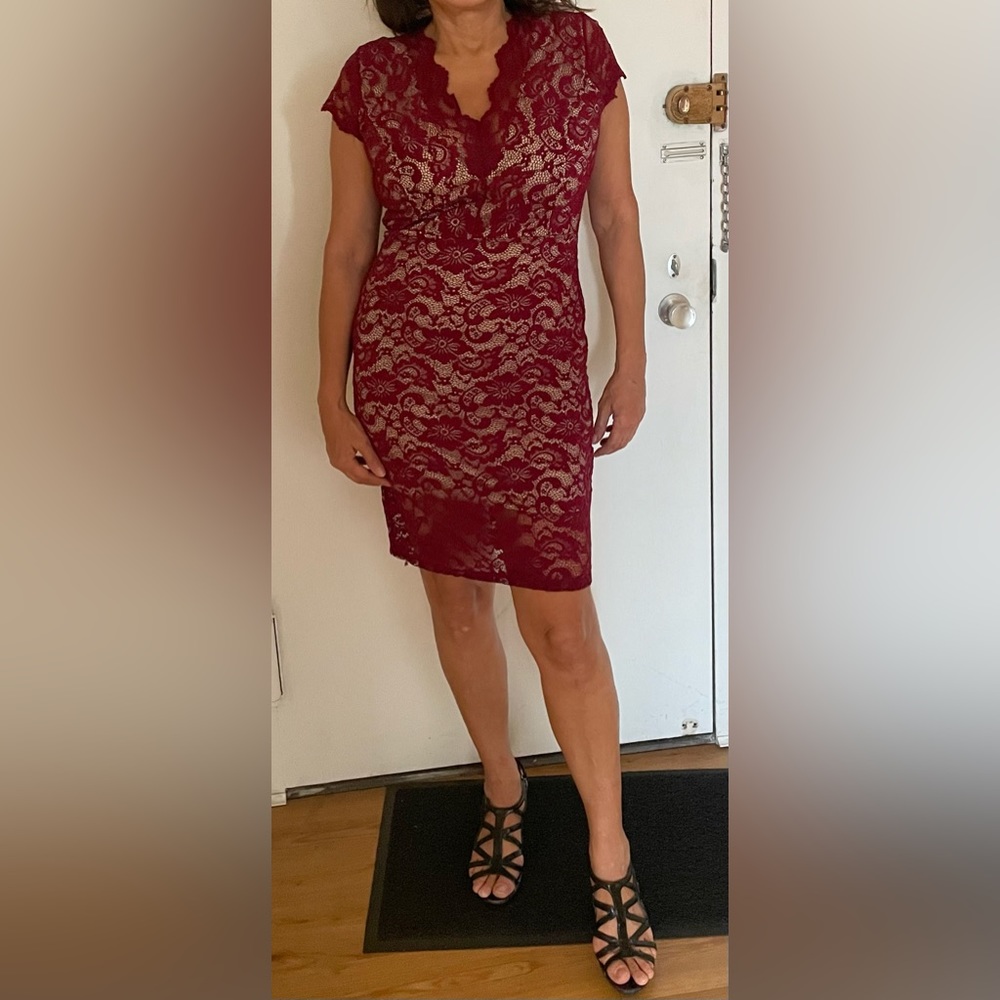 Burgundy  lace dress size XL but runs small I’m a size L.